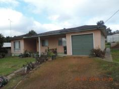  2 Nix Street Boyup Brook WA 6244 Great family home, short walks to schools and shops, no need to use the car, Quiet location in a cul-de-sac street with nice views. Front door leads to a wide tiled entry hall; the good size lounge has a reverse cycle air conditioner. The country kitchen/dining room has modern bench tops and mostly drawers, dishwasher, split level gas stove and a huge walk in pantry. The main bedroom is a generous queen size and the other 2 are double size all bedrooms have wwc. The bathroom has a full size bath and shower recess. WC is off the laundry. Off the back veranda is a studio/craft room which could be used as an office. Under the main roof is a single garage with a remote door. A steel workshop is behind the house and it has power connected. This is a very solid, well built home constructed on a concrete slab, timber framed and clad with hardi flex striated board. 