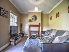  6 Eleanor Street Goulburn NSW 2580 Timber, 2 bedroom Cottage in Goulburn's East. Ideal for an investor or first home buyer. Possible rental return ($235 - $250 a week). Close to Goulburn East Primary.  Features include - 2 Bedrooms – Main with Built in  Kitchen - Stainless steel electric cook top, oven and range hood  Antique Beacon Hill Cast Iron Stove  Gas Heating  Modern Bathroom with Laundry  Rear Deck with views of the city  505m2 Block 