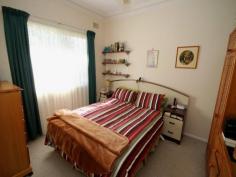  12 Haven St South Grafton NSW 2460 An air conditioned formal lounge opens onto an east facing front verandah with expansive views. There is a formal dining area, however, a breakfast area has been incorporated into the modern laminated kitchen that boasts large pantry space and new electric range. The bathroom features both shower and tub with toilet located separately. An extra large main bedroom includes wardrobe and an air conditioner. A shade sail protects the rear timber deck during summer months and can be taken down to allow in more sunshine over winter. That makes it perfect for bbq's. The shady yard is quite private and only takes a few minutes to mow. An extra large single garage provides storage and workshop space, plus, there is a carport to keep a 2nd vehicle or maybe a boat out of the weather. A really beaut little street with little traffic and great neighbours. Definitely must be inspected so put it on your list. 