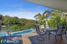 20 Bruce Ave Caringbah South NSW 2229 SUMMER BY THE BAY Privately
 positioned in a tranquil leafy setting with beautiful views across Port
 Hacking, this impressive tidal waterfront home has been designed with 
the modern family in mind. Three separate living areas include a 
dedicated home cinema, a spacious open lounge / dining flooded with 
natural light and self contained entertaining zone on the lower level 
that lends itself to the possibility of guest / In-law accommodation. 
Floor to ceiling timber bifold doors on both levels take full advantage 
of the stunning vista and allow a seamless flow between indoor and Al 
Fresco living spaces. Completing this enviable lifestyle package is a 
resort style pool with entertaining terrace and easy access to the 
waterfront facilities including storage area, ramp and electric winch. KEY FEATURES     Ample off street parking     Boat ramp and winch     Home Cinema Room     Private Tidal Waterfront     Resort style entertaining     Self contained rumpus