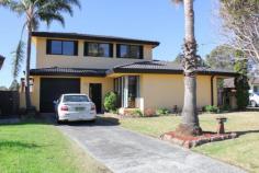  15 Kathleen Cres, Woonona, NSW 2517 Nice rendered two level home with four bedrooms and study/office, BIW's, two bathrooms, polished timber floors, large garage, fantastic covered entertainment/BBQ area, work-shop, all on a level block backing onto a reserve. 