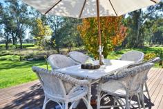 1692 Benalla-Tatong Road MANSFIELD VIC 3722 Resting amongst an absolutely gorgeous backdrop, this charming rustic hideaway is purely a must to inspect, because it will not last long! Set on 10 acres approx (including creek front leasehold - 4.1 acres freehold), with direct frontage to Hollands Creek. Immaculately presented property which has been professionally refurbished and landscaped by renowned interior & landscape designers. Creatively refurbished historic cottage combining modern comforts with original features. Original floorboards throughout, Open plan living with R/C A/C and Coonara, separate dining and modern kitchen with stainless steel appliances and feature pressed metal walls. 2 huge bedrooms both capturing the magnificent outlook. Master BR features ensuite with sunken bathtub. Huge entertaining deck looking out towards the creek flats, the natural lagoon (with pontoon!) and over surrounding farmland - perfect for relaxation. Additional to the home there is a fully S/C caravan plus excellent shedding - part of which has had partial renovation to create extra accommodation. Extensive productive fruit & vegetable gardens, plus a great chook shed - the perfect self-sufficient country escape.  