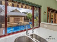  57 Petra St Palmyra WA 6157 CONTEMPORARY CHARACTER 
			
			
				 UNDER OFFER With its award winning alfresco pool area 
and completely renovated and refurbished interior, this charming family 
home blends low maintenance liveability with abundant character and 
warmth. Original wide polished timber floors, high ceilings and 
period fire places blend easily with a modern extension with a nod to 
fuss free, laid back family living. Behind its elegant 1920s 
character facade, this welcoming family home mixes all of the charm of 
its origins with contemporary, open plan living. On the doorstep 
of the Petra Street shopping strip, within the Richmond Primary School 
catchment zone, just moments from Fremantle and the river, this is a 
versatile home in a sought after East Fremantle location. It 
features an enclosed cottage style front garden providing a sense of 
security and enough garden to keep young ones entertained. Beyond
 the trademark federation veranda, it opens into a wide central hallway 
and two large bedrooms with soaring ceilings and elegant leadlight 
windows overlooking the garden. Generously proportioned with the 
option of a master bed and study or second living space, this home 
offers up a versatile ground floor footprint with space for a growing 
family. The spacious master bedroom retains its original high 
ceilings, picture rails and generous floor to ceiling height with the 
addition of a contemporary white on white ensuite with an adjoining 
walk-in-robe. The spacious open plan kitchen, living and dining space is this home's natural focal point. With
 a panel of west facing bi-fold timber doors opening onto a stunning 
recycled jarrah decked entertaining space, it is full of natural light 
with an easy, informal ambience. A spacious, open kitchen with 
pale stone bench tops and an array of all Tasmanian oak cupboard space 
looks out over the rear pool area with bi-folds opening it up for easy 
movement between indoors and out. The modern, open plan extension
 takes in a third and fourth bedroom sharing a large second bathroom 
with spa, separate shower and toilet in the same clean, contemporary 
aesthetic. A rear alfresco, covered entertaining space with an 
abundance of year round northern sunlight looks onto the salt-water pool
 with an adjoining limestone block water feature. This is an 
immaculately maintained family home well positioned to take advantage of
 all that this community minded, river front suburb has to offer. Surrounded
 by cafes, restaurants, parks playgrounds and schools, this is an 
opportunity to make the move to one of Perth's most sought after 
southern suburbs. FEATURES: -4 bedrooms,2 bathrooms -Renovated character home on a low maintenance 443sqm block -Secure single car garage with workspace and hardstand -Award winning salt-water pool with spa jets and retractable solar pool blanket -Timber decked alfresco space with water feature -Open plan extension with high ceilings and ample storage -Large kitchen with timber bi-folds onto entertaining deck - Ducted reverse cycle airconditioning - Large loft storage area with pull-down ladder -Master suite with contemporary ensuite and walk-in robe -Large second bathroom with spa and separate shower -Solar panels -Rainwater tanks -Original wide jarrah boards, ceiling roses and leadlight windows -In the Richmond Primary School catchment area -Minutes from the Petra Street shopping precinct, Fremantle, the river and beaches   