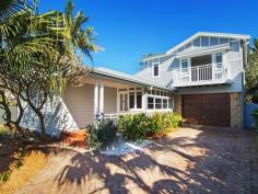  20 Cliff Rd Collaroy NSW 2097 Nestled in one of the Northern Beaches 
most prestigious and peaceful enclaves, this beautiful home enjoys the 
essential elements of contemporary Australian seaside living. 
 
Features Include: 
 
- Combining the original character of Collaroy Basin architecture with modern style and 
 space, designed for an elegant but relaxed lifestyle 
 
- Spacious living with vaulted ceilings and warm chocolate floors flow through bi-folds 
to a sundrenched north facing private travertine terrace 
 
- Stunning kitchen designed to bring family and friends together around the ideal island 
bench complimented with stunning stone tops and ILVE oven will make cooking a joy 
 
- The terrace is a natural extension to the living area and is surrounded by level lawn and mature 
tropical garden 
 
- On the entry level is a generous queen bedroom with sitting area, bright single bedroom or 
study and the main bathroom which features a bath and stunning Italian floor tiles 
 
 - Main bedroom with large built in wardrobes and doors opening to a lovely sunny east 
facing balcony creating a wonderful air-flow 
 
- Oversize lock up garage with auto entry and room for storage has internal access 
 
 A pretty facade, this is the ideal home for those who want to live just
 metres to the surf and Long Reef in modern beach house in style and 
comfort. 
 
Council Rates:$855.99 per quarter 
Water Rates:$176.00per quarter + usage 
 
Contact 
 
Gordon Spring 0418 210 219 gspring@ljhooker.com 
Kim Jeffery 0410 553 919 kjeffery.collaroy@ljh.com.au 
 
   Read more at http://collaroy.ljhooker.com.au/NPQF6Q#4S4KczQgDIUXsMqf.99 