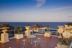 2 Denning St South Coogee NSW 2034 Prime position, opposite parklands and never to be built out ocean and coastline views. 
 
Nothing has been spared in this quality built home that oozes class and 
style, from the granite floors to the Waterford crystal chandeliers. 
 
Spanning over three levels, this home was built for the large family with entertaining in mind. 
 
Entry level, with granite tiles throughout the casual and dining areas with direct access to large balcony and amazing views. 
 
Formal and informal living areas, fabulous kitchen, granite bench tops, integrated fridge and loads of storage. 
 
Top level consists of 4 spacious bedrooms, all with built-in robes. 
 
The main bedroom (parents wing) with retreat area, full sized bathroom with spa and double basins and pear wood robes. 
 
A second bathroom accommodates the remaining three bedrooms, laundry shute and walk in linen cupboard. 
 
Lower level, triple garaging, fully tiled, bathroom, sauna and leafy garden complete with pizza oven. 