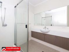  21/37 Orenco Bend Clarkson WA 6030 Conveniently located within 100m of the Clarkson train station and situated on the first floor, this light bright and modern 2 bedroom 2 bathroom apartment offers a high class level of living on a budget designed for the money conscious. Situated in a secure and low maintenance complex, this wonderful apartment features a tiled entrance that leads into a spacious open plan living and meals area, which opens up further via a sliding patio door that t leads out to a large tiled balcony, which is just perfect for relaxing on, during one of Perth's beautiful summer evenings.  The modern and well appointed kitchen features both below bench and overhead cupboards, a microwave and refrigerator recess, plenty of bench space and also comes complete with stainless steel appliances including and under bench electric oven, range hood, electric cook top and dishwasher. The ‘New York’ style laundry off the hallway includes a wall mounted clothes drier, laundry trough and space for a washing machine, and to the opposite side of the hallway you will find a large linen press and the one of the modern bathrooms, which features a full sized bathtub, separate shower and vanity. At the end of the hallway you will find the spacious Master Bedroom, including matching 'his and hers' built in mirrored door wardrobes, and a private modern ensuite, along with the second bedroom, which is double in size and also features a built in mirrored wardrobe. The apartment is kept at the perfect temperature all year round via the large split system air conditioning unit and also comes complete with a large lockable storage room that is located opposite the front door of the apartment, plus it also has a secure parking bay.  All this will enable you to live the lifestyle you crave without the stresses of budgetary restraints!  