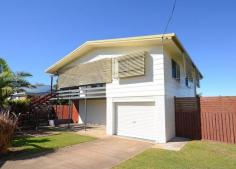 13 Paradise Street, Point Vernon This neat 3 bedroom home is set in a quiet area of Hervey Bay and is complete with in-ground swimming pool. 
 
New timber and slate style flooring has been installed. The kitchen is 
compact while the bedrooms have inbuilt drawers and wardrobe space. 
 
Downstairs could be a teenagers retreat or games room as it has two bedrooms, separate toilet and bathroom. 
 
The one car garage could also be used as living and storage space. There is a sizeable laundry on this level. 