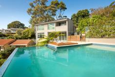  1 Talinga Pl Lilli Pilli NSW 2229 Quiet Style Sleek architectural lines, sophisticated contemporary style in a private elevated position, enjoying a pleasant natural outlook and sunny north aspect define this modern, multi level family residence. High Points - Land size 784sqm (approx.) - Multiple indoor and outdoor entertaining areas - Master retreat with ensuite on separate level - Solar heated salt water infinity pool	 - Private, level lawn and garden - Lower level gymnasium/home office - Double garage with internal access  - Quiet, quality family friendly locale 