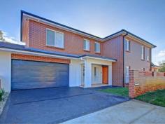  30A Kerrie Crescent Peakhurst NSW 2210 Brand New DuplexThis brand new duplex is located close to schools, transport and shops. Features; 4 bedrooms with built-ins, 3 bathrooms with en-suite to main bedroom, Spacious gas kitchen with stainless steel appliances and stone bench-tops, large living and family room with separate dining, spacious backyard and double lock-up garage. Land is 430sqm approx. this duplex is attached by garage. 