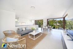 20 Bruce Ave Caringbah South NSW 2229 SUMMER BY THE BAY Privately positioned in a tranquil leafy setting with beautiful views across Port Hacking, this impressive tidal waterfront home has been designed with the modern family in mind. Three separate living areas include a dedicated home cinema, a spacious open lounge / dining flooded with natural light and self contained entertaining zone on the lower level that lends itself to the possibility of guest / In-law accommodation. Floor to ceiling timber bifold doors on both levels take full advantage of the stunning vista and allow a seamless flow between indoor and Al Fresco living spaces. Completing this enviable lifestyle package is a resort style pool with entertaining terrace and easy access to the waterfront facilities including storage area, ramp and electric winch. KEY FEATURES     Ample off street parking     Boat ramp and winch     Home Cinema Room     Private Tidal Waterfront     Resort style entertaining     Self contained rumpus