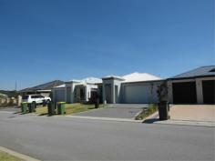  14a NORTHERLY Harrisdale WA 6112 3 bedroom 2 bathroom home is in a great location opposite a park. Features open plan kitchen/dining/living, formal lounge, study nook, easy care gardens, fully secure yard, double lock up garage, private alfresco area.  
