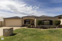  22 Catspaw Ave Beeliar WA 6164 COME FEEL RIGHT AT HOME HERE!! As you walk in the large double door entrance you immediately get that feeling of quality and that you truly are at home. This stunning 4 x 2 family home is situated in the much loved Meve Estate, positioned on the street to capture stunning views of the city and surrounding area.  *Large king size master Bedroom with his and her walkin robe, which leads to a great size ensuite. The ensuite is tiled from ceiling to floor and includes large corner spa bath, vanity, shower, IXL light/heat lamps and separate toilet.   *Remaining bedrooms are all queen sized with carpet, bedrooms 3 and 4 have stunning views and complete with walk in robes. *Outside entrance features cedar lined ceiling with downlights. *Sunken lounge room with beautiful lighting and carpet. *Separate formal dinning area. *Stunning kitchen with large bench top giving plenty of room for a breakfast bench, lots of cupboards including overhead cupboards, stainless steel appliances including electric oven, gas hot top with range hood, dishwasher, double sinks and large pantry. The shoppers entrance allows for easy access. *Kitchen is part of open planned area, over looking another dining area and 2nd lounge which leads to alfresco area.   *Large reverse cycle ducted air conditioner. *Gas bayonet for extra heating is located in the open planned area. *Large linen, big laundry with separate toilet. *Black Butt flooring throughout. *Feature lighting throughout home as well as outside just show the class of this home. *Large paved outdoor entertaining area has cedar lined ceiling with down lights, caf blinds to fully enclose the area and spectacular views.   *There is a great patch of grass but the feature of the backyard is the lower decking area and water feature, fantastic for entertaining and finished with a no fuss garden with automatic reticulation. There is also a rear gate for access from the front. *Large double garage with automatic door with extra room for storage. Located near local shops, primary schools, easy public transport and just minutes to both Cockburn Gateways Shopping and Coogee beach this home is a must see.   
