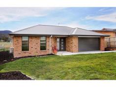  7 Sadri Court, New Norfolk, TAS 7140 Set over two levels this large home (building size over 250sqm) has enough space to accommodate the whole family in comfort. The upper level comprises of open plan kitchen and dining, which features pantry and ample bench space, aswell as having access to a sun deck - the ideal place to relax and enjoy the beautiful outlook over Lenah Valley to the water and rolling hills beyond. The large lounge is separate and also host to the views. The home is soaked in all day sun, however infloor heating provides extra warmth for those cooler days. The huge master bedroom in big enough to be a living area in itself and has builtin robes. A second bedroom or office sits alongside. As well as the first bathroom which offers shower, vanity and separate toilet.  Heading downstairs another large room can be used as either the third bedroom or a rumpus room - which ever meets your requirements. The fourth bedroom is set behind this room, as well as another bathroom with shower, vanity and bath plus seperate toilet. Two extra rooms are carpeted and provide a place for storage and workspace however would be suitable for a fifth and sixth bedroom subject to council approval. Back upstairs there is internal entry from the double garage into the home. Set on a no through road in the popular suburb of Lenah Valley - where you are only moments away from services and Hobart CBD. If you have a large family looking for extra space - then this is the home for you! 