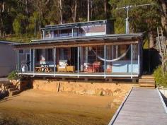  107 Richard Rd Scotland Island NSW 2105 Dabble your toes or fish right off the edge of the verandah in this 
utterly charming fully renovated cottage of timber floors, high ceilings
 and combustion fire. 
 Beautifully appointed with two double bedrooms, the main with its own
 private deck with views stretching across sparkling Pittwater to 
Ku-ring-gai National Park. 
 Ideal for entertaining in the spacious modern kitchen with an open 
plan lounge/dining area which open onto the wide verandah, perfect for 
relaxing. 
 Complete with deep water jetty, pontoon and its own sandy beach. This
 cottage is and ideal weekender or for a complete lifestyle only 45 
minutes from the CBD. 