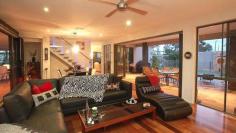  8-10 Kambah Place Reedy Creek Qld 4227 Relax and entertain with family and friends in the 9 metre salt water pool with attractive water feature and outdoor shower while enjoying complete privacy Impress all with the Italian floor tiles throughout and Italian bench tops in the note worthy German Craft kitchen with additional plumbed fridge included and glass feature screen The Spotted gum floors literally light up the whole entrance and formal living area while the sandstone on the patios enhance the beauty of a the quiet serene setting The main bedroom offers amazing storage and wonderful ensuite with spa with exceptional furnishings and mesmerising wall paper rarely seen in Australian homes 