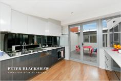   216 B La Perouse Street, Red Hill, ACT 2603 Sleek and Stylish A great opportunity has arisen to purchase in the sought after suburb of Red Hill. This newly built stunning townhouse is perfect for living in style, with a fashionable design and modern luxuries.  The property supports the highest quality appointments, including a gourmet kitchen featuring stainless steel Miele appliances, Caesar stone bench tops, butler’s pantry, beautifully presented bathrooms, security system and intercom. The residence is light and airy with plenty of windows offering an open plan lifestyle, and two private court yards, one internal and one at the rear.  The large master bedroom, walk in robe, ensuite and private deck are situated on the ground floor as well as the study. Upstairs consists of bedrooms two, three and four both and the main bathroom. Only minutes from Manuka and Kingston Centres, the Parliamentary Triangle and the lake foreshores this townhouse is perfection!  Features: • 	 4 bedrooms • 	 2 bathrooms plus powder room • 	 Study  • 	 Internal court yard • 	 External courtyard • 	 Solar hot water with gas booster • 	 Double Glazed windows • 	 Reverse cycle air conditioning in master bedroom and living rooms • 	 Insulated concrete forms • 	 Timber flooring in living areas and hallway • 	 Carpet in bedrooms • 	 Double lock up garage with internal access • 	 Miele appliances • 	 Caesar stone bench tops in kitchen, bathrooms, laundry and workshop • 	 Intercom and security system • 	 Grassed lawn to the rear • 	 Foxtel connection • 	 Prevision for NBN • 	 In ground water tank 3,000 litres  