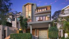 24 Rosedale Avenue Fairlight A residence of rare distinction and style, this cleverly transformed 
character residence combines low maintenance practicalities with 
spectacular indoor/outdoor entertaining venues. Set against an inspiring
 180 degree panorama that takes in views across the harbour to the 
ocean, it is nestled in a premier quiet leafy address. Spectacular harbour views stretch to the ocean through Sydney Heads Striking cement rendered facade rests on a solid sandstone base Generous living space opens to wide harbourside terracotta terrace Formal dining area, casual living and dining areas flow to courtyard Upstairs family room opens to elevated terrace with spectacular views Sleek open plan CaesarStone kitchen with gas cooktops and dishwasher Double bedrooms with built-ins, chic bathrooms with marble tiled floors Covered rear courtyard, near level easycare lawn and elevated deck Stroll to harbour walks, handy to Balgowlah Village and Manly Beach Lock-up garage, carport, sandstone storeroom plus wine cellar, bamboo floors Council: $2,204pa approx Water: $980pa approx 