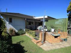  12 Haven St South Grafton NSW 2460 An air conditioned formal lounge opens onto an east facing front verandah with expansive views. There is a formal dining area, however, a breakfast area has been incorporated into the modern laminated kitchen that boasts large pantry space and new electric range. The bathroom features both shower and tub with toilet located separately. An extra large main bedroom includes wardrobe and an air conditioner. A shade sail protects the rear timber deck during summer months and can be taken down to allow in more sunshine over winter. That makes it perfect for bbq's. The shady yard is quite private and only takes a few minutes to mow. An extra large single garage provides storage and workshop space, plus, there is a carport to keep a 2nd vehicle or maybe a boat out of the weather. A really beaut little street with little traffic and great neighbours. Definitely must be inspected so put it on your list. 
