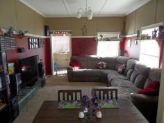  23 Stanton Street Stanthorpe Qld 4380 OPEN THIS SAT (02 Aug) 10 -10.45am. Wow! Check out this price for a property in town! House is rendered with iron roof and brick stumps. 2 bedrooms, small sunroom with effective wood heater, lounge/dining area with easy layout kitchen, bathroom, sep laundry and ideal covered rear deck overlooking family size grounds - good size -1062m2 with garden shed, fenced.  Car accommodation and 16 solar panels feeding back to grid. Just a stroll to nearby local shop and easy quick zip to main street and schools! Seller wants offers NOW! Asking just $175,000..... very little left at this price!  