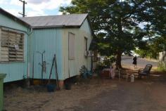  38 Ham Street, Cloncurry, Qld 4824 38 Ham Street is a fabulous opportunity to build in a great location.
 Close to town and across from a school. Perfect location for teachers 
accommodation, potential to attract excellent tenants. Large 1,012m2 
rectangular shaped block ideal for units or villas (subject to council 
approval). Power and sewerage are already available to this freehold 
property. A dwelling is on the block which appears to be an 
uncomplicated demolish with opportunity to recover some vintage timber. 