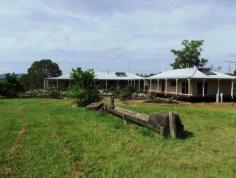  167 Fosters Lane, Anderleigh, Queensland If youve been searching for a home with everything, then its safe to say youve been having problems. Well not anymore- this must surely be the one. Sitting on 80 acres of lush green improved pastures plus approval for B & B is this five bed two bath main residence with wrap around verandas, 9 foot ceilings, porcelain bench tops, open plan kitchen dining, a gas stove & slow combustion stove, large walk in pantry, modern country cupboards, huge lounge, grey ironbark timber floors, ceiling fans throughout, solar hot water system and a large main with walk in robe & large ensuite. The second residence is a smaller version of the main with two bed one bath, wrap around verandas, open plan living area, ceiling fans throughout, porcelain bench tops, a gas stove & a slow combustion stove, walk in pantry, grey ironbark timber floors & solar hot water system. Water is no worries with numerous rainwater tanks. To top off this property is a extra large shed with concrete floors, living area in one end, a large machinery shed, stables, cattle yards, vet crush, three paddocks, three holding paddocks, five dams and two seasonal creeks. At this price youll find it very hard to resist this property with over 700m2 under roof so be sure to call for an appointment to inspect. It’s beautiful. 