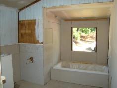  48 Pine St North Ipswich QLD 4305 Calling all renovators, bring your tools this one needs some hard yakka. Sitting high on a 1012sm allotment this home is an unfinished masterpiece oozing with potential. Featuring 4 bedrooms, open plan areas, high ceilings, VJ walls, timber floors, wood heater and front verandah. Possibility of building in underneath, some plans and Council approvals available to view. 