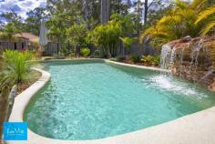  13 Vesta Close Springfield Lakes QLD 4300. This is an absolutely stunning Sherlock custom built home that you will 
fall in love with as soon as you come for a viewing. This is truly your 
dream home that you have been waiting for and presents like brand new! 
 
Your
 family will just LOVE this 35m2 Masterpiece featuring 4 bedrooms + 2 
living areas... with a beautiful inground swimming pool to enjoy all 
summer long!!!! All situated on a large 863m2 block with Vesta close 
being a fantastic location as the house is situated in a serene and 
private cul-de-sac street against the bushland reserve. 
 
Stunning 
front entrance appeal you will enter into a wide and welcoming hallway 
leading to a great sized lounge area with it's own private decked sala. 
On the other side of the private hallway you will find 3 great sized 
bedrooms with extra wide robes, all with ceiling fans and vertical or 
timber style blinds. 
 
As you walk towards the back of the home you
 will pass the timber french doors which creates separation from front 
to back for privacy and leads you to the open plan kitchen, dining, 
lounge area with high raked ceilings and quality finishes such as stone 
bench tops in the well appointed kitchen including blanco stainless 
steel appliances. 
 
The master bedroom at the back is absolutely 
gorgeous and huge with separate his and her walk in robes and double 
sink ensuite with double shower. 
 
Both the master bedroom and open
 plan living areas lead onto your fantastic undercover patio 
entertaining area overlooking your perfect poolside paradise. This will 
surely become your favourite place for relaxing or enjoying those party 
occasions. 
 
Extra features: 
3 Kw solar electricity Panels 
Gas cooktop 
Rainwater tank 
Security Alarm system 
Double side gate access perfect for the trailer, small caravan, boat 
Inground concrete swimming pool with beautiful water feature 
Stone bench tops in gourmet kitchen and all bathrooms 
Fisher and Paykel dishwasher 
Blanco stainless steel appliances 
Panasonic Inverter split system 
Security Screen windows and doors 
 
This
 beautiful home is only minutes drive or walk to the new train station, 
close to the university, schools, lakes and parks. Exciting new 
developments include stage 2 of Orion Shopping centre, Event Cinema 
complex and hospital. Call now for your personal Viewing !