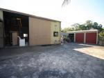  56 Carlo Rd Rainbow Beach QLD 4581 Great location as it is the first business you see when entering the 
industrial area and you are only minutes to the boat ramp. Live onsite 
and take advantage of a terrific business opportunity not to mention a 
lifestyle dream, of boating and fishing. 
 
 Features:
 * Large 3 bay lock-up shed
 * Separate Large Workshop with attached residence 
 * Overseeing office area
 * Above ground pool
 * Double carport
 * Large livable onsite caravan
 * Walking distance to shops & school
 * Minutes drive to boat ramp & popular fishing spots
 * Ample boat, truck and car parking
 
 Take the advantage now and invest.
 