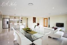  22 Hoffman Drive Marian Qld 4753 This stunning high quality, family home is sure impress. As soon as you enter the home you will notice the high quality fit out, from the water feature at the front entrance, and sandstone tiles on the front porch. The home is fully air-conditioned and security screened and features 4 large built-in bedrooms + study/5th bedroom. The large main bedroom, features a good sized walk-in robe with plenty of hanging and shelving space + beautiful en-suite featuring a double vanity with trendy basins and stone bench top + fully tiled glass free shower with wall recess.  Large open plan family and dining with beautiful porcelain tiles and built-in "bamboo" wall feature" + modern island style kitchen featuring, stone bench-tops, stainless steel "Bosch" appliances including dishwasher, trendy pendant lights and walk-in pantry which has built-in cabinetry. Separate carpeted lounge/theatre room. Beautiful main bathroom also with glass free, fully tiled shower with wall recess + modern vanity and bathtub. Good sized laundry and double remote control garage off the house, directly off the kitchen for easy access with the groceries. Living area leads out to the large patio also with beautiful sandstone tiles, perfect for outdoor entertaining + concrete path all the way around the house. Huge 1,00m2 fully fenced allotment with side access to the back yard. Heaps of room for the pool and shed. 