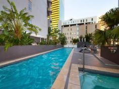  126/ 18 Tank Street,BRISBANE CITY QLD 4000 This modern, spacious 12th floor apartment in the heart of Brisbane's CBD represents an outstanding investment or lifestyle opportunity for those seeking inner-city living at its best. With magical panoramic views from the spacious alfresco entertaining area as the river city shines at night, entertaining with friends or even just unwinding after a hard day will be an exceptional experience. The sleek contemporary design features, generously proportioned bedrooms, open-plan living with a study area, entertainer's kitchen with stone bench tops, as well as brand new carpets and paint throughout, make this apartment feel “as new”.  The twin outdoor balconies are framed with large glass sliding doors that bathe the living areas in light and allow you to make the most of our relaxed Queensland lifestyle. Offering the ideal location, the Evolution building is within easy walking distance of the South Bank cultural precinct, Roma Street gardens, and the Queen Street Mall. An on-site car space is included but you may never want to leave home with amenities including a heated lap pool, spa, gymnasium, games room, media room, sky lounge and BBQ area. If you are looking to join the growing ranks of those discovering the joys of relaxed inner-city living, then this apartment ticks all the boxes. For those keen to invest, this apartment offers a range of options: either long-term rental (approx. $620-$650 per week unfurnished, or $690 - $730 furnished) or take advantage of the on-site management which offers short-term letting or a rental guarantee arrangement.  The exceptional CBD location, large floor plan (approx. 107m2), and views that can't be built out all help protect your investment long-term. If you are looking to invest in the always-growing Brisbane CBD market, you can't go past this opportunity.    