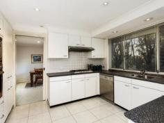 48 Samuel St Peakhurst NSW 2210 Family Living - Location Plus Enjoy
 a contemporary lifestyle of style and comfort in this immaculately 
presented dual level home, which is perfectly designed to easily 
accommodate a growing family. The home features an open floor plan, 
formal and informal living areas, drive through lock up garage to yard 
and bonus double lock up garage with an excellent entertaining area. 
Only minutes walk to Peakhurst & Lugarno shops, Cafe's, schools and 
parklands. - 4 bedrooms all with built in robes + potential 5th bedroom or home office downstairs - Huge main bedroom with massive ensuite and built in robe - Upstairs rumpus/family room perfect for the kids to watch movies and play - Open and spacious light filled formal and informal living areas - 3 way main bathroom with separate shower and toilet - Chefs kitchen with stainless steel appliances and gas cooking - Ducted air conditioning upstairs and split system air conditioning downstairs - Internal laundry with external access + bonus 3rd toilet - Backyard perfect for entertaining and the kids to run around and play - Drive through lock up garage to backyard + double lock up garage with separate workshop - Minutes' walk to Peakhurst & Lugarno shops, Cafe's, schools and parklands   Property Snapshot Property Type: House