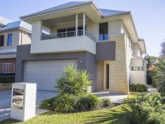  120B View Terrace Bicton WA 6157  The Art of Easy Living Occupying a commanding corner lot with an impressive street elevation, this sleek and contemporary styled W& BN constructed residence (completed 2010) excels in every aspect of good design. Presenting 'as new', the home's abundance of natural light creates a relaxed ambience that is carried through a free-flowing floor plan. Designed for casual living and entertaining with three separate living areas, the home's versatile layout provides a 'sense of space' while allowing practical separation. An exceptional home suited to those looking to take advantage of the wonderful lifestyle benefits of this highly sought after riverside precinct. - Chic modern kitchen with Caesarstone bench-tops and stainless appliances - 3 living zones including formal lounge, spacious open plan living and upstairs retreat - Zoned ducted reverse cycle a/c - Electronic alarm system - Feature timber flooring - Private outdoor entertaining overlooking easy-care manicured yards - Secure double garage - 382sqm Green Title 