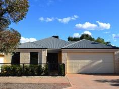  82 Keenan Street Kalgoorlie Hannans WA 6430 The fussiest of buyers will be impressed by this stunning home situated in Hannans. Built in 2006 this home has been maintained to the highest standard, the home features quality fixtures and fittings along with a theatre room. A large family room situated at the rear of the home overlooks a great sized patio for entertaining. Exquisitely designed with a calming neutral décor, both summer and winter living is at your fingertips. Featuring: *Built in 2006 *Theatre Room *Gourmet kitchen with stainless steel appliances *Built in robes * Natural gas heating *Ducted air cooling *Great sized patio overlooking easy care gardens *Connected to mains gas *413sqm Approx Block 