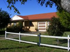  174 Macalister St Murgon QLD 4605 3 bedrooms, modern built in kitchen with stainless steel appliances, large family rumpus room. Separate lounge with air conditioning. Good paintwork and floor coverings. Ceiling fans. Bathroom has a bath and separate shower, toilet separate. Double lock up garage with store room at the rear. Separate garden shed. Fully and well fenced. Town and tank water. Tiled roof. Currently tenanted at $220 pwk, lease runs to December 2014. 