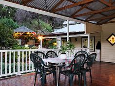 34 Heidelberg Rd Bickley WA 6076.Simply enchanting Honeysuckle Cottage' (circa 1900's)and STUDIO with an 
enormous Alfresco DECK which captures the heavenly valley VISTAS, 
offered by only a select few properties on a near ACRE on tightly held 
and glorious Heidelberg Road. 
 
Laced with beautiful, abundant 
LEADLIGHT, gleaming TIMBER floors and high ceilings, romance and charm 
encompasses the dear Teddy Bears in residence and I am sure will capture
 your heart too. 
 
This desirable, rambling Cottage provides 
relatively GENEROUS LIVING areas currently utilizing a Living Room, 
Family/TV Room, Study Nook and Formal Dining (or Activity) plus the huge
 elevated Alfresco Deck (approx 8.6m x 8m) in addition to the gracious 
Verandahs, which provide a fantastic forum for entertaining and family 
togetherness with that STUNNING OUTLOOK down the Bickley Valley. 
 
A
 delightful free-standing pocket STUDIO (plumbed and powered) with it's 
charming bull-nosed verandah is potentially INCOME-PRODUCING and has 
current Shire Approval as a Hair and Beauty SALON or I expect a dream 
for an Artist or Hobbyist Retreat. 
 
Set on 4031sqm with meandering
 paths to the GAZEBO and through the gracious and pretty GARDENS with 
delightful pockets and a selection of delectable Fruit Trees. A generous
 working BORE supplements SCHEME WATER to the property. 
 
A secondary drive-way provides access to the WORKSHOP, CARPORT and Studio. 
 
Complete with a PONY PADDOCK and a small animal shelter, this may be that last box to tick on your wish list. 
 
What
 a DREAM within minutes to Services and highly regarded Schools and 
Colleges in Bickley, Carmel and Lesmurdie. Zip through to Welshpool Road
 for great access to the Airports and Perth City. 
 
This is SPECIAL
 for Cottage and Bickley lovers looking for some extra space and those 
gorgeous VISTAS. Please contact Pamela on 0409 581 008 to arrange your 
inspection. 
 
Weatherboard and Zincalume Residence (c1900s) 
Elevated huge, gabled Patio Alfresco 
-- approx 8.6mx8m - built 2010 
-- beautiful Valley Vistas 
Beautiful Character including 
-- Stained Leadlight Glass (most rooms) 
-- Timber Floors (also under carpets) 
Cottage style Kitchen, dishwasher, pantry 
Living Room plus Family/TV Room 
Study Nook 
Dining Room (Activity or large Study) 
Master Bedroom, Ensuite, WIR 
Additional 3 Bedrooms, Bathroom, Laundry 
 
Free-standing STUDIO (approx 3mx2m) 
-- bull-nosed Verandah 
-- powered and plumbed 
-- electric HWU (instant) 
-- split r/c A/C 
-- potentially Income Producing 
-- currently approved as a Hair and Beauty Salon
