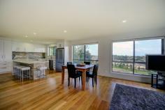 26 Brennan Ct Coffs Harbour NSW 2450 Property ID:     39P1627 Property Type:     House Land Size:     832m² approx. Bed     4 Bath     2 Park     2 Construction:     Brick Outgoings:     Council Rates: $2654 / yr Features     Built-In Wardrobes     Ensuite     City Views     Ocean Views     Remote Garage     Deck     Outdoor Entertaining Area     Fully Fenced     Dishwasher     Floorboards Try to contain your excitement when you enter this impeccable, quality built home! Boasting breathtaking mountain views, a city skyline, ocean glimpses and the finest level of appointments...nothing has been overlooked in creating this mere 1 year young home...just perfect for a professional couple or family. Featuring a light filled designer kitchen with stone benches and stainless steel appliances, Grand Oak flooring, "smart glass" energy efficient windows and a spacious open plan living & dining area. This beautiful home also comprises of three bedrooms upstairs, the master providing a full ensuite, walk in robe and access out to the fantastic under roofline deck. Downstairs discover an oversized 4th bedroom currently being utilised as a training centre due to the separate entrance it offers to clients. On a private 832sqm fully fenced block that has been landscaped for low maintenance living, relaxing is easy as there is plenty of space for the kids while you sit back and enjoy the outlook. Completing the house is a remote double lock up garage and plenty of storage. One inspection is all you will need to appreciate that this home has been stylishly built with the finest attention to detail. This property is strictly inspection by appointment so contact us today to arrange a time....as tomorrow might be too late!