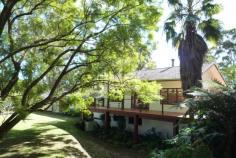 1492B Coramba Rd Coramba NSW 2450 Property ID:     39P1217 Property Type:     House Land Size:     5 acres approx. Bed     3 Bath     2 Park     2 Construction:     Rendered brick and tile Outgoings:     Council Rates: $1178 / yr Features     Built-In Wardrobes     Close to Shops     Close to Schools     Balcony     Outdoor Entertaining Area     Dishwasher Nestled onto a treed 5 acre block, this value packed home boasts a 'feel good' factor that immediately makes you feel like you've come home! Spacious rooms of yesteryear and beautiful hardwood timber flooring set the mood in this immaculate home. Offering 3 spacious bedrooms, high ceilings , 2 living areas and a wonderful sense of openness this is a home to be lived in and enjoyed. The large living/dining area opens through stunning timber doors to the sensational wrap deck designed to make entertaining a breeze and allowing you to let the good life begin. The well appointed kitchen makes entertaining a breeze and overlooks the valley, there is ample room for a pool, add a woodfire, loads of natural light and all the bases are covered. There's plenty of garaging/parking and an abundance of wildlife adds to this idyllic lifestyle. Priced to sell, our owners are keen to secure a quick sale. We have obtained all information in this document from sources we believe to be reliable; however, we cannot guarantee its accuracy. Prospective purchasers are advised to carry out their own investigations.