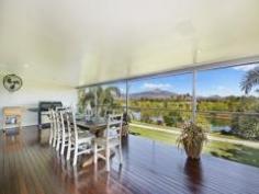 Idalia Your dream home is here!!! This stunning 437 m2 residence has been 
designed to enchant with a level of opulence that must be seen to be 
believed. Offers the perfect floor plan for families, combined with a 
wonderful lifestyle, on the river in Idalia. Offering great views in a 
quiet peaceful enviable location!!! This home is a genuine opportunity 
like no other to own a statement home, in which meticulous design and on
 entering this much loved Balinese residence, has the feeling of 
elegance and charm and is immediately apparent. This 2 storey 4 
bedrooms, 2 bathroom residence has a very large open plan living area on
 the top level opening onto large front deck for large family 
gatherings. Gourmet kitchen with large breakfast bar, stone bench tops, 
double oven and large walk-in pantry the full length of the kitchen. 
Media/family room plus separate granny flat for Mum or teenagers 
retreat. Tropical resort style in-ground pool with low maintenance 
gardens and on a 804 m2 allotment. 3 car accommodation, large workshop,
 plus room to park a boat/caravan inside the property. Out your front 
gate and you are on the walkway beside the river. Watch the canoeists 
row by or just put a line in to catch dinner.
 Great views across the River and over the Golf Course and Mt Stuart. Inspection is an absolute must.
 What a lifestyle on offer here!!! 