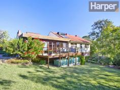 10 Kurra St Charlestown NSW 2290 This charming four-bedroom 
family home offers abundant old-world style on a large corner block in a
 peaceful bushland setting with an idyllic northerly aspect close to 
Charlestown Square and just 10 minutes to Newcastle CBD and beaches. The
 separate living and dining rooms feature quality slate flooring and 
timber walls with peaceful bushland views from the adjoining timber deck
 that’s particularly special at sunset. The huge country-style 
kitchen features gas cooking, dishwasher and plentiful bench and 
cupboard space, with additional room for informal dining. An 
additional formal lounge, library, study or sitting room presents a 
stunning vaulted ceiling, open fire, built-in shelving, exposed brick 
feature wall and timber walls. The generous main bathroom 
features walk-in frameless glass shower, separate bath, floor-to-ceiling
 tiles and striking wrap-around corner vanity with timber bench top. There
 are polished timber floors and ceiling fans to the four generous 
bedrooms, and the rear, elevated timber deck overlooks the huge backyard
 with large lawn and established gardens. An over-sized two-car garage completes the package. The property also features: -- Solar hot water -- Water tanks -- Under-house storage -- Gas stove -- Entry foyer This
 classic family residence is a genuine dream home that’s big on 
understated style and old-world appeal. Move in with no work to do and 
begin enjoying this one-of-a-kind home immediately. This quality 
family home will not last long so don’t let this opportunity slip 
through your fingers and act fast to book your private viewing today. Inspections Inspections by appointment only. Features General Features     Property Type: House     Bedrooms: 4     Bathrooms: 1     Land Size: 657 m² (approx) Outdoor     Garage Spaces: 2 
