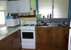  101 TWELFTH Avenue Home Hill Qld 4806 Lowset 2 bedroom plus sleep-out dwelling in a great location. On a 809M2 fully fenced allotment, needs TLC but has potential to renovate. Separate living area, kitchen/dining area, timber floors, shower separate to toilet, enclosed laundry, one bay carport and currently rented @ $200 per week. TAKE THE TIME TO VIEW. 