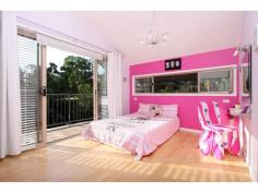  41 Phillips Street COOCHIEMUDLO ISLAND QLD 4184 Family Reunion Magic Huge Coochie Beachhouse Opportunity At the end of the day many of us ow realise this life is about relationships and family. Well here is the opportunity for 3 or so families to share their own holiday home and also rent it when the family are not sing it. We all dream of living on a beautiful tropical island. That dream comes true in this home just 160 metres from sandy Norfolk Beach. Welcoming your family and friends onto your spacious front deck. We all crave the simple pleasures of life, well this bright airy, huge five bedroom, four deck, three level home provides living in true beach house style, with water views and every room opening to decks capturing magic bay breezes. 