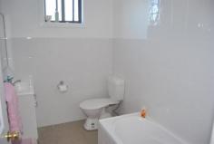 2 Burranjurra Ave Pacific Palms NSW 2428 4 Bedroom Home with Rural Outlook Immaculate 4 bedroom home set in a quiet location at Coomba Park. This
 large home features lounge room separate family/rumpus room with 
polished timber floors, wood fire, r/c air in lounge room and large open
 kitchen. There 4 good sized bedrooms with built in robes & ceiling fans, 2 bathrooms and a level backyard. To
 complete the package there's a good size garage with an extra storage 
shed out the back, 2 water tanks, solar power and all of this located 
just a few minutes walk to Wallis Lake. Great outlook in a very private location. Download your FREE brochure NOW and call Troy Perrim or David Shaw on (02) 6554 0188 to arrange your private viewing. Forster Pacific Real Estate, Pacific Palms - Boutique Coastal Property Specialists... ***Real Estate Agents***Auctioneers***Property Managers***Stock & Station Agents*** Property:    House Bedrooms:    4 Bathrooms:    2 Parking:    1 Land Size:    556.4 Sqm Rooms:    Lounge/Living Workshop Family Room Dining Room Features:    Additional Storage Local Amenities:    Community Centre Shops Playground Park Council:    Great Lakes