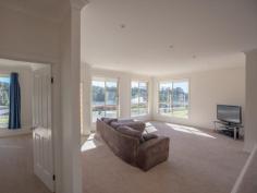  Bermagui   NSW   2546 A high quality 3 bedroom ensuite home with great street appeal, plus additional boat/caravan garaging. A sunny and spacious open plan design features a split level living space at one end, that adds interest and variety to the design. At the other end sits the kitchen with stainless steel oven and ceramic cooktop, and access to a paved rear patio. The living space and front verandah enjoys northerly views over the surrounding area with ocean glimpses in the distance. As well as a double garage with internal access to the house, there is a detached metal garage with extra high clearance especially for boats or caravans. 