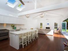  20 Cliff Rd Collaroy NSW 2097 Nestled in one of the Northern Beaches 
most prestigious and peaceful enclaves, this beautiful home enjoys the 
essential elements of contemporary Australian seaside living. 
 
Features Include: 
 
- Combining the original character of Collaroy Basin architecture with modern style and 
 space, designed for an elegant but relaxed lifestyle 
 
- Spacious living with vaulted ceilings and warm chocolate floors flow through bi-folds 
to a sundrenched north facing private travertine terrace 
 
- Stunning kitchen designed to bring family and friends together around the ideal island 
bench complimented with stunning stone tops and ILVE oven will make cooking a joy 
 
- The terrace is a natural extension to the living area and is surrounded by level lawn and mature 
tropical garden 
 
- On the entry level is a generous queen bedroom with sitting area, bright single bedroom or 
study and the main bathroom which features a bath and stunning Italian floor tiles 
 
 - Main bedroom with large built in wardrobes and doors opening to a lovely sunny east 
facing balcony creating a wonderful air-flow 
 
- Oversize lock up garage with auto entry and room for storage has internal access 
 
 A pretty facade, this is the ideal home for those who want to live just
 metres to the surf and Long Reef in modern beach house in style and 
comfort. 
 
Council Rates:$855.99 per quarter 
Water Rates:$176.00per quarter + usage 
 
Contact 
 
Gordon Spring 0418 210 219 gspring@ljhooker.com 
Kim Jeffery 0410 553 919 kjeffery.collaroy@ljh.com.au 
 
   Read more at http://collaroy.ljhooker.com.au/NPQF6Q#4S4KczQgDIUXsMqf.99 