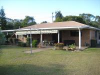 59 Murdoch Road, QLD, 4670 Australia Lowset Brick 3 bedroom with ensuite, big 5000sm block elevated overlooking the sugarcane fields at the rear, double lock up garage with extra carport at the rear for Boat or camper van, above ground swimming pool, no neighbors - one side with macadamia trees, the most amazing sunsets in the afternoon over the Fields. 