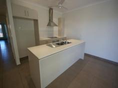 3/10 Scott Court FARRAR NT 0830 This fully air conditioned 3 bedroom unit features ceramic tiled flooring throughout with the open plan living and dining area offering views onto the tiled rear verandah and landscaped private rear yard. A well completed galley style kitchen is completed with stone benchtops, electric appliances including a dishwasher, generous storage space and the fridge alcove has a water tap for a plumbed in fridge. The master bedroom is of a good size and offers a built in robe with sliding mirrored doors and louvre windows with security bars allowing full ventilation. The ensuite off the master bedroom is completed with a double shower and a stone benchtop to the vanity.  The 2nd and 3rd bedrooms offer built-in robes with sliding mirror doors and louvre windows with security bars, within the passage is alcove fitted out with storage cupboards and benchtop. The laundry is located in the hallway neatly concealed behind concertina doors, the main bathroom is spacious and offers separate shower and bath. Located within the roofline of the rear verandah is a storeroom, the rear yard has a boundary garden and lawn which is irrigated. The property is fully fenced, there is a side pedestrian gate and a clothesline is fitted to the side wall, there is undercover parking for 2 vehicles and the front of the unit. The small complex is well presented and maintained, it is a short walk to a local residential park and a short drive to Palmerston CBD. 