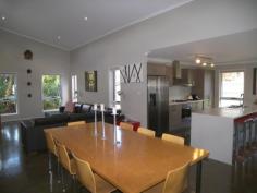 5 Gara Ct Ocean Shores NSW 2483 This near new 4 bed 2 bath 
beautiful home features high ceilings with celestial east facing windows
 which incorporates the best of modern living and design. This Spacious 
retreat is in a level quiet cul-de-sac but oh so close to the action 
with convenient access to the shopping centre and Brunswick Heads cafes 
and beaches. All the bedrooms have built ins with a lovely large ensuite
 in the main and the 4th bed/ office having sliding doors that allow the
 morning sun to stream in. The modern kitchen with breakfast bar has gas
 cooking, dishwasher and everything you need to entertain in style. The 
home has solar hot water, ceiling fans and energy efficient insulation 
as well as making great use of its great solar aspect. Polished concrete
 floors in the dining / living finishes this impeccable classy light 
filled residence and is a pleasure to inspect. Landscaped gardens and 
double carport with fly-over roof add to the appeal of this immaculate 
home. Low maintenance and fully fenced yard is great for the kids or to 
entertain in summer. Priced to perfection just like the build at just 
$444,000. Enquire today! 