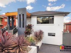 159 Hillcrest Ave Greenacre NSW 2190 Exceptional Family Residence Impressively designed is two-level home is sure to please the large family and entertainer. With a contemporary décor throughout the 4 bedroom home offers: - Modern cement rendered brick veneer structure - An upper level with formal lounge and large verandah overlooking rear yard - Two luxurious and quality fitted bathrooms one with stand alone bath - A lush timber stair case leading to the lower level which offers - An open floor plan of family living with a cinema-like feel - The exquisite kitchen has granite bench tops, gas stainless steel appliance and dishwasher. - Great for get-togethers, the bi fold doors access an outdoor decking overlooking the back yard & above ground swimming pool. - Having all the extras you can ask for, the home also includes ducted air conditioning, complete security with alarm system & surveillance cameras, visual intercom, auto gates and auto sensored lights - Set on 607 sqm with 15.24m frontage this rarely offered property is a must see, must buy!   Property Snapshot Property Type: House Construction: Brick Land Area: 607 m2 Features: Alarm Built-In-Robes Decking Dishwasher Garden Shed Gas Granite Benches Video Intercom Walk-In-Robes