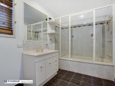  22 Kesteven Street Albany Creek Qld 4035 Behind the doors of this grand looking house is a home you will love raising your family and entertaining friends in. This home has five large bedrooms all with built in wardrobes and four are air-conditioned. There are two bathrooms (the ensuite is massive) and a separate powder room. Everything is in pristine condition. There is absolutely nothing to be done here. Downstairs has a large kitchen/dining area and a very open lounge room as well as one bedroom. You access the back undercover pergola from the kitchen/dining and the kitchen has a servery providing easy access when entertaining. The grounds are landscaped and low maintenance and the 9,500 litre water tank is large enough to take care of the garden and washing vehicles. The way this home is positioned and with the established gardens it offers exceptional privacy.  And if you need storage, then look no further. Youll find room for everything with a pantry, a walk-in linen cupboard that is almost large enough to be called another room, storage under the stairwell, a shed in the back, as well as the double lock up garage.  Other notable features include: - Freshly painted. - Security screens on all doors and windows. - Ceiling fans. - Air conditioned. - The Albany Creek Shopping Mall and Tavern, as well as all the professional services one needs, ie. doctors/dentists, etc. are easily accessible. The pathway right beside the house takes you through Hilltop Historical Park to Faheys Road East and from there it is a short stroll to the heart of Albany Creek. - The bus stop is close by and buses run regularly to Brisbane City, the Chermside Interchange, the Aspley Hypermarket, and Eatonvale.   