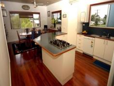 3 Cook Street, Tully, Qld 4854 - Relaxed Living - Fabulous For Families - Janice Gallagher Real Estate - North Ward Nestled at the base of the mountain with a leafy outlook is this 
fantastic family residence that is spread over two levels (floor area 
600m2 approx) enjoying a feeling of space and provides a lifestyle that 
everyone will envy.
 It has been thoughtfully designed to capture great breezes 
guaranteed to impress and its immaculate with its unprecedented natural 
flow, light and spaciousness.
 The home boasts 5 bedrooms with built-ins, 2 bathrooms, study, family room, and games area.
 Huge rear veranda which is perfect for entertaining family and friends.
 5 car accommodation plus abundance of storage
 Exceptionally appointed throughout, this home boasts polished floor, a/c, chef delight gourmet kitchen with huge walk in pantry
 Fabulous sparkling in ground pool and beauty abounds here with low maintenance gardens
 This spectacular property is family friendly and expansive, boasting multiple living areas both indoors and outdoors
 Plenty of grass and gardens surrounding the home for the kids to play on a sprawling 1416m2 allotment
 Schools and shopping all within close proximity
 This location is convenient and practical for your family needs. 